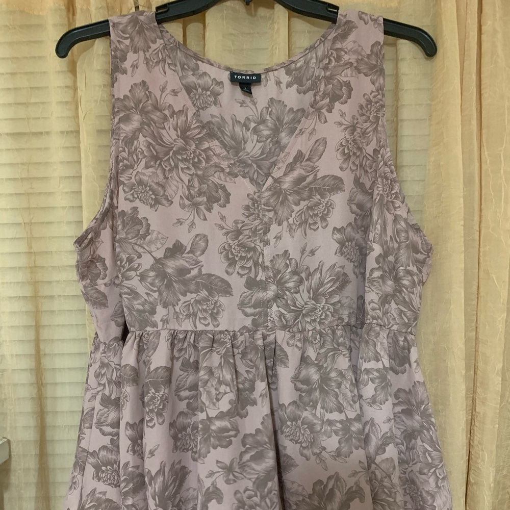 Plum/ Purple peplum top. Torrid Size 2